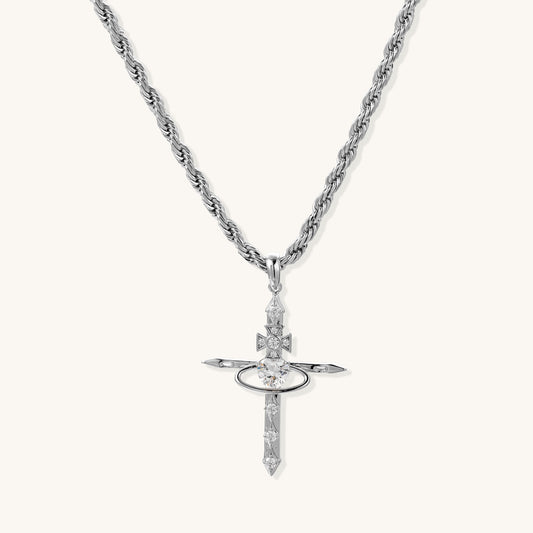 Gold-plated brass statement necklace with celestial cross pendant featuring orbital ring and zirconia stones on rope chain